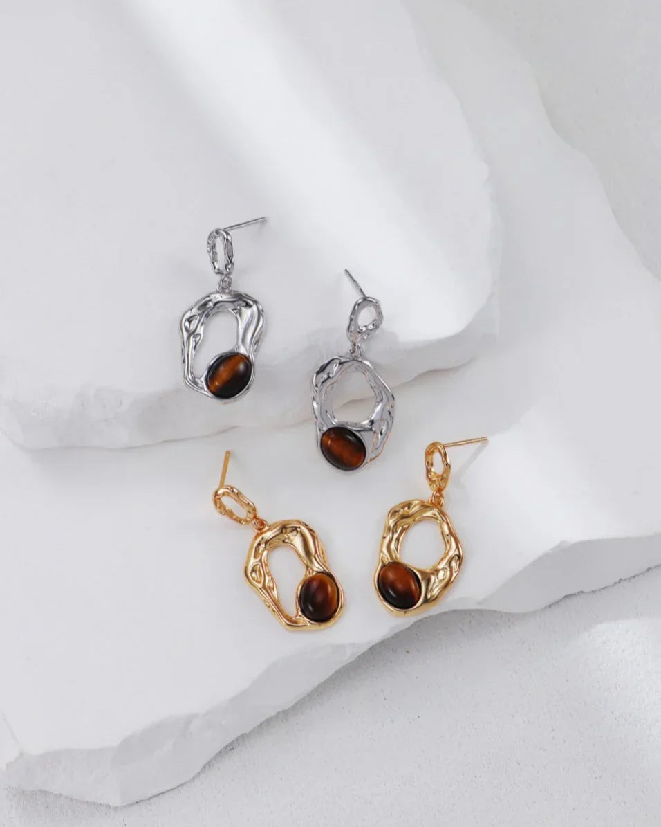 Flytende Orbit-øredobber