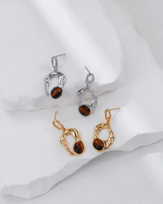 Flytende Orbit-øredobber