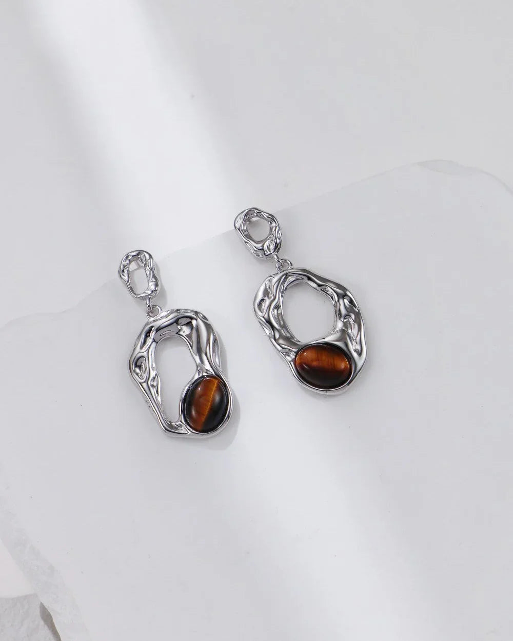 Flytende Orbit-øredobber