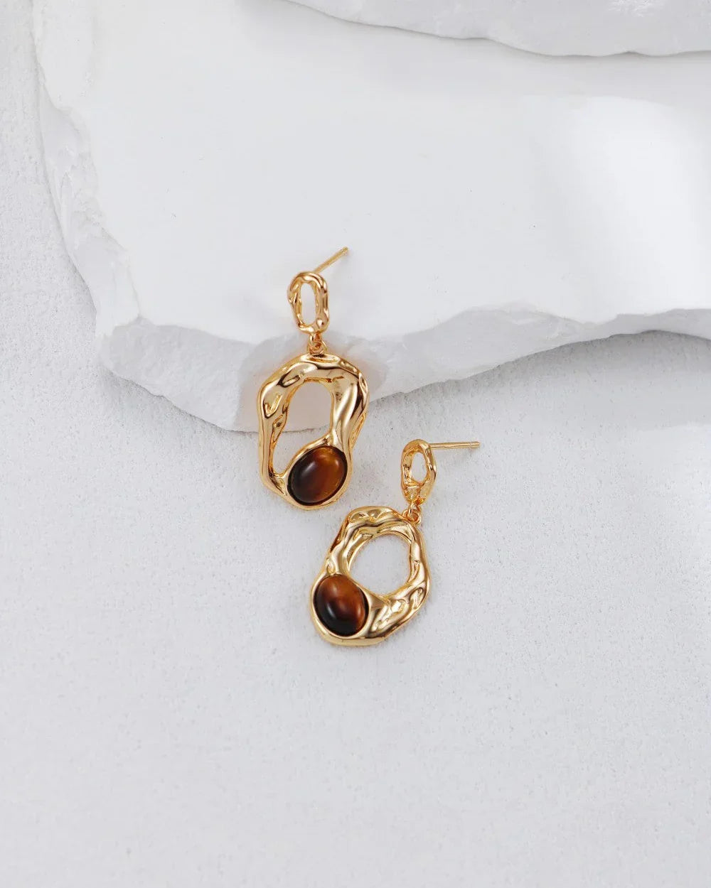 Flytende Orbit-øredobber